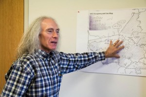 Tribal attorney Joe Plumer and a map of the 1855 treaty boundaries. © Jolene Yazzie for Al Jazeera America.